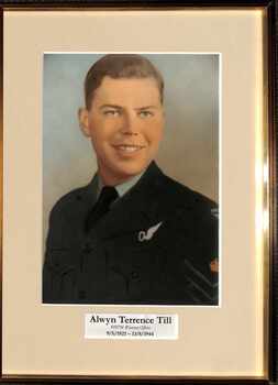 Coloured studio portrait of Alwyn Terrence Till in uniform.