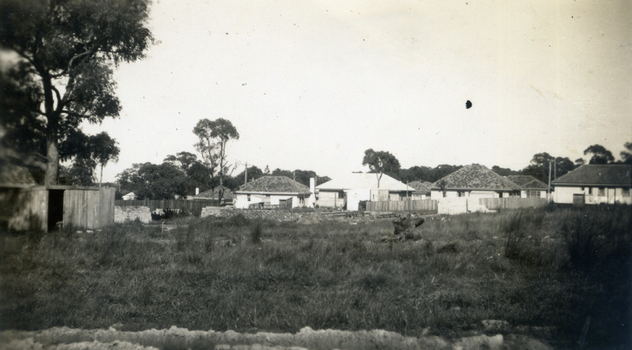 Twelve small black and white photographs (a-m) of the erection of Max Grant's house at 8, Hazelmere Avenue, Mitcham. 