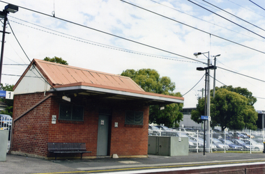 Historic brick station master's house on the south side of the Mitcham railway station 2012.