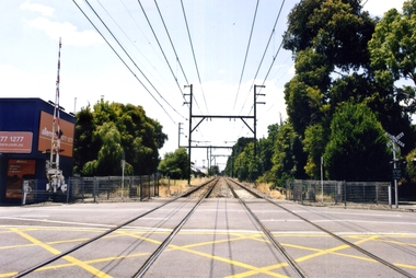 oured photograph of the Blackburn Road railway crossing at Blackburn, looking east towards Ringwood - 