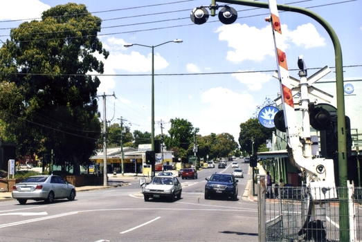 Coloured photograph of Blackburn Railway crossing on Blackburn Road. 