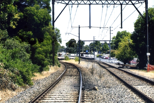Coloured photograph of the railway line near the Blackburn station, heading west towards the 'city