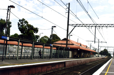 Coloured photograph of the southern platform of the Mitcham Railway Station looking west - 2012