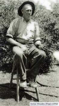  Viictor Rhodes seated on a stool