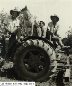 Black and white photo of Cecil Rhodes sitting in front of a tractor