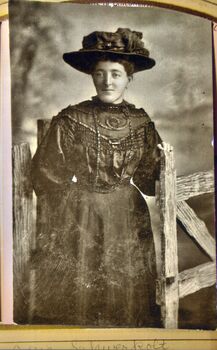 epia photograph of a woman dressed in dark colours