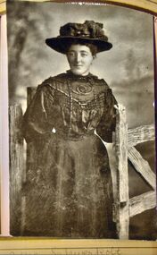 epia photograph of a woman dressed in dark colours