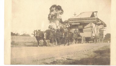 Sepia photo of house moving.