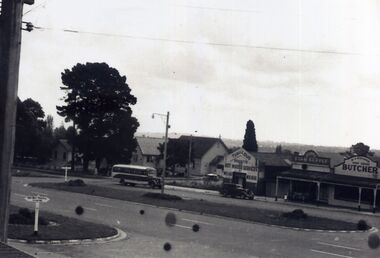 Early black and white photograph of shops in Whitehorse Road Mitcham.