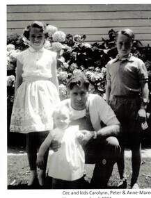 Black & white photograph of Cecil Rhodes and his 3 children.