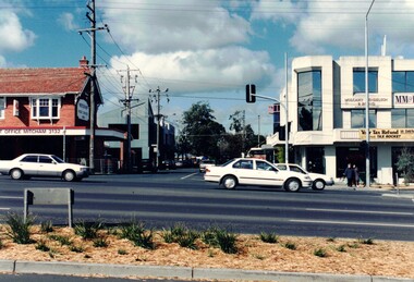 Coloured photograph of Station Street Mitcham looking South. Main road is Whitehorse Road