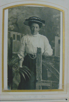 Copy of a black & white studio portrait of Wilhelmina Schwerkolt. 