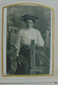 Copy of a black & white studio portrait of Wilhelmina Schwerkolt. 
