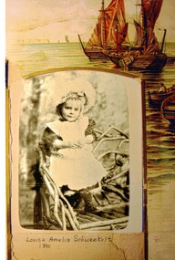 Sepia copy of photograph of Louisa Amelia Schwerkolt. Photograph is surrounded by a mount.