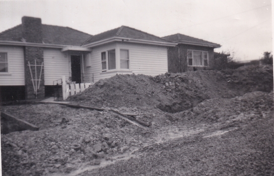 Eight black and white photographs showing the development of the house at 13 Marong Tce Forest Hill 1956 to 1958.