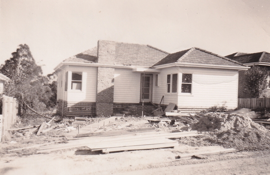 Eight black and white photographs showing the development of the house at 13 Marong Tce Forest Hill 1956 to 1958.