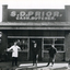  Dud Prior outside his second butcher shop in Blackburn Road , built in 1920.