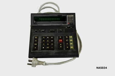 Compet CS - 1109A. Black top "Sharp" electric calculator, bottom is cream.