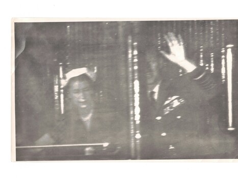 Queen Elizabeth and Prince Phillip departing Mitcham by train.