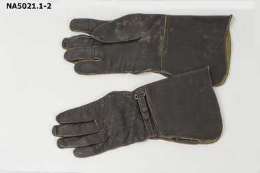 A pair of dark brown leather gloves,.