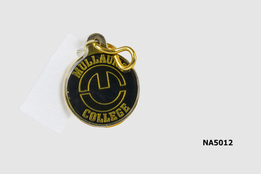 Mullauna College badge, a black circle with " Mullauna College" in gold writing.
