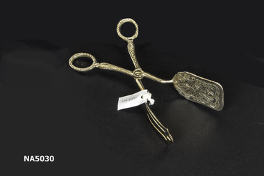 Silver plated cake server.