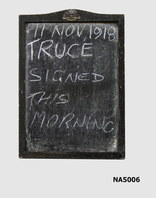 Black framed blackboard surmounted by AIF crest.