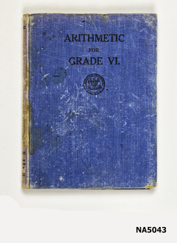 Blue coloured text book " Arithmetic for Grade VI".