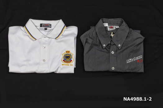 White, . Grey short sleeved man's shirts "Mitcham" and "R.S.L" embroidered on left hand side above left hand pocket. 