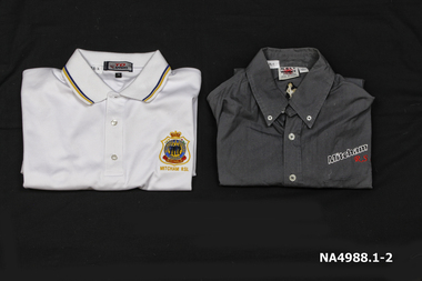 White, . Grey short sleeved man's shirts "Mitcham" and "R.S.L" embroidered on left hand side above left hand pocket. 