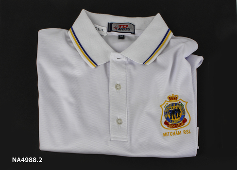 White man's polo shirt with RSL badge embroidered on left side 'Mitcham RSL' under badge. A blue and yellow stripe around collar and cuffs on sleeves
