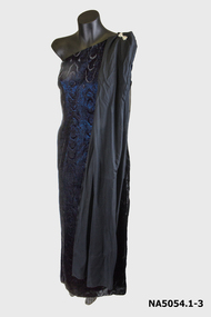 Off the shoulder full length sheath sleeveless dress of more velvet shot with blue lurex.