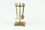 Brass fire irons.