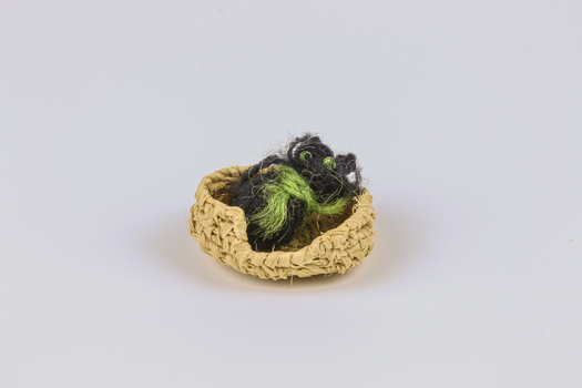 Miniature knitting basket.