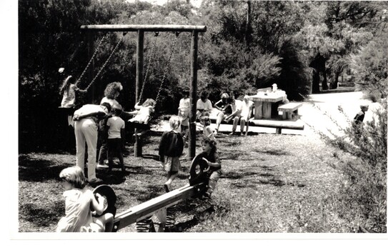Picnic in the grounds of Schwerkolt Cottage showing BBQ area.