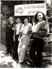 Black and white photograph of four of the migrant welfare team.