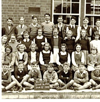 Four black and white photographs showing various classes.
