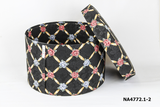 Black fabric hat box with lid decorated with blue and red roses