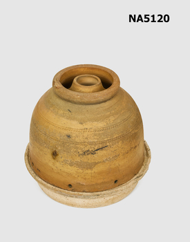 Terracotta butter cooler with lid.