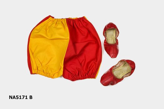 Jester costume - bottom - red bloomers and orange & red cape with hood and bells attached, with a pair of red shoes.