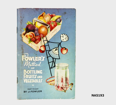Small light blue book on how to bottle fruits and vegetables