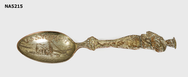 Souvenir teaspoon the handle in shape of sailor and etching of ship in bowl.