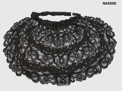 Female black lace cape.