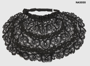 Female black lace cape.