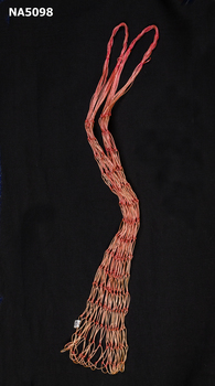 Long thin string bag with twisted string handles and knotted bag
