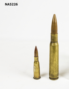 A bullet with a casing.
