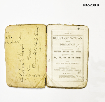 Rules of syntax and derivations. Book belonged to T. E. Harris of Princess Hill State School.