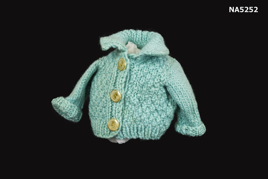Doll's cardigan with long sleeves and collar.