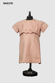 Child's handmade apricot wool dress and bolero jacket.