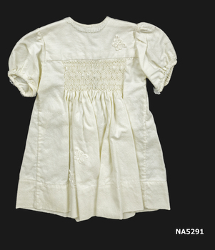 Smocked cotton baby dress.